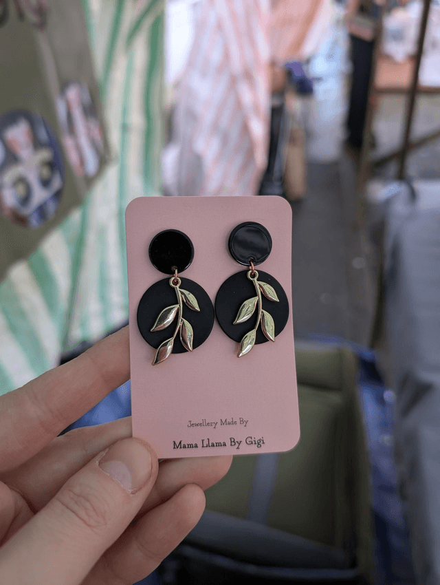 Black brass and golden leaf earrings 