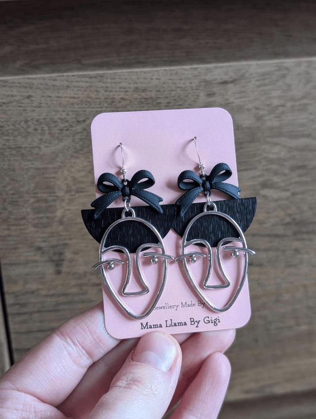 Girl in a bow earrings 
