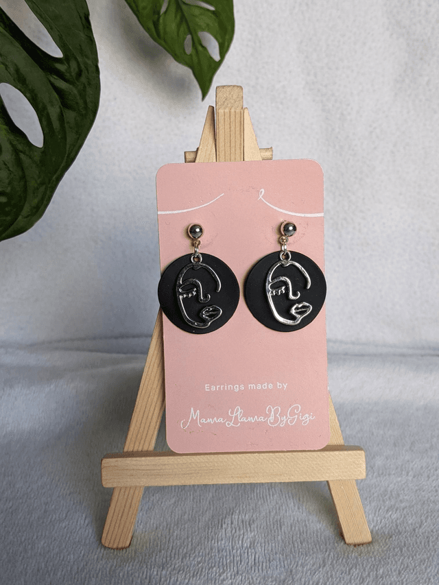 Elegant Black and Silver Face Line Art Earrings
