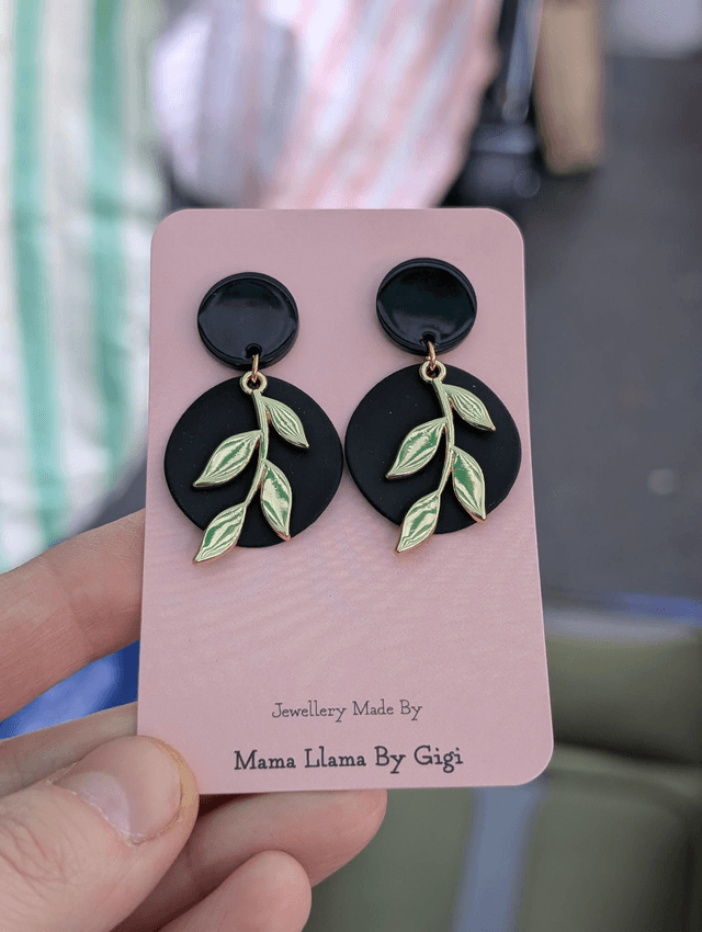 Black brass and golden leaf earrings 