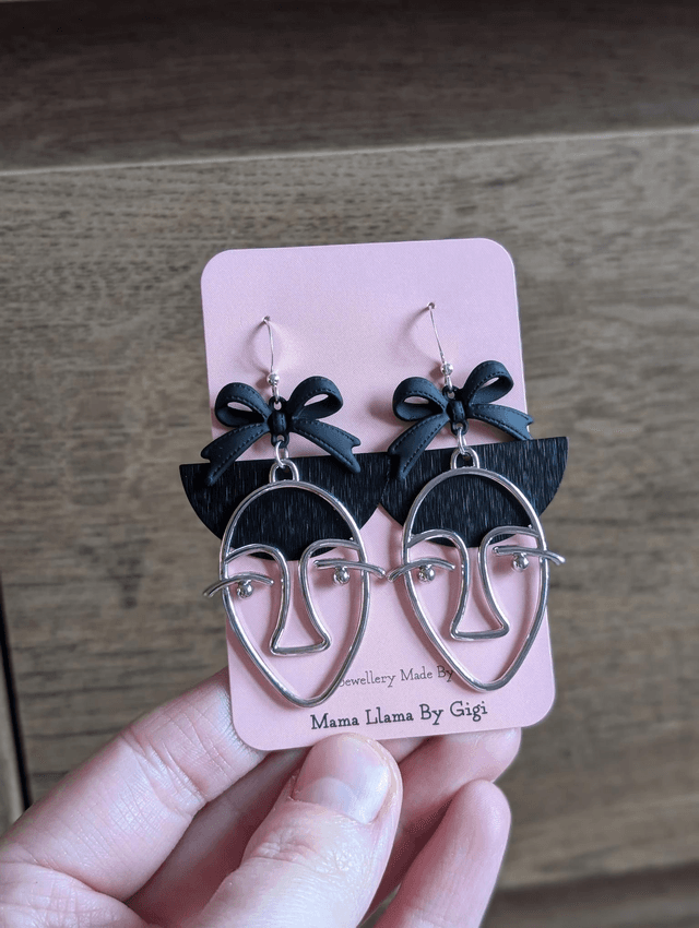 Girl in a bow earrings 