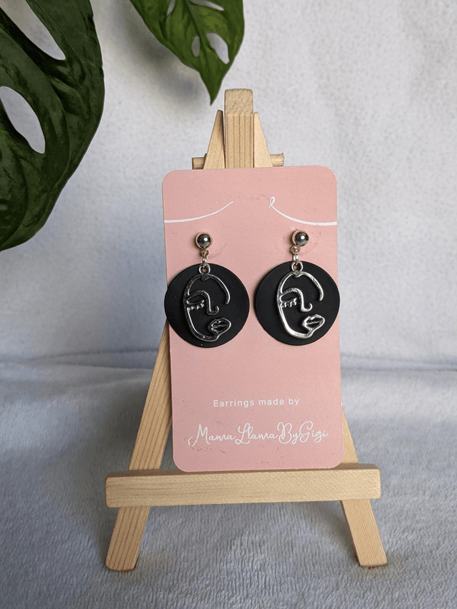 Elegant Black and Silver Face Line Art Earrings