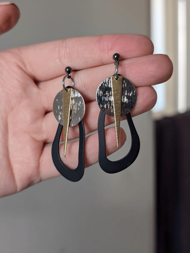 Lacey Warrior earrings silver gold and black
