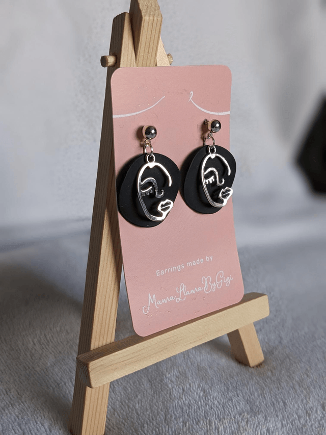 Elegant Black and Silver Face Line Art Earrings