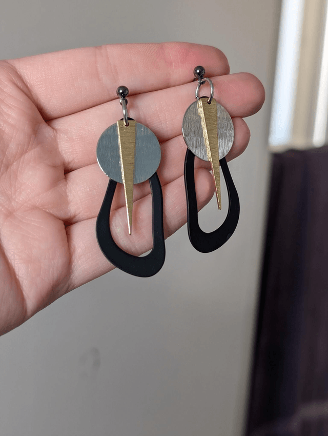 Lacey Warrior earrings silver gold and black